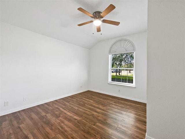 unfurnished room featuring ceiling fan, lofted ceiling, and dark wood-type flooring