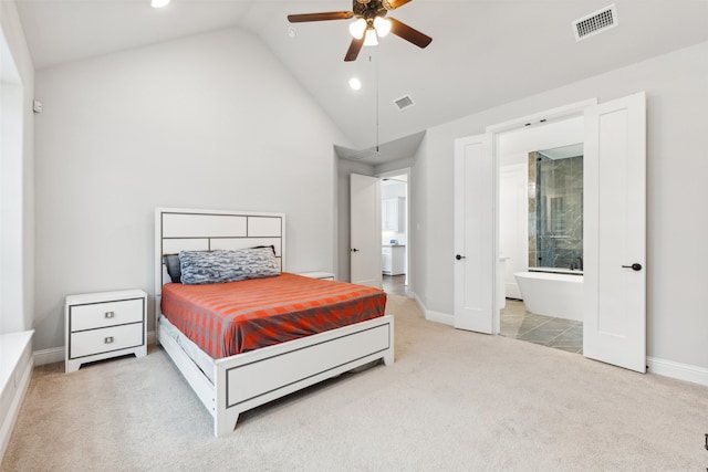 carpeted bedroom with ceiling fan and vaulted ceiling