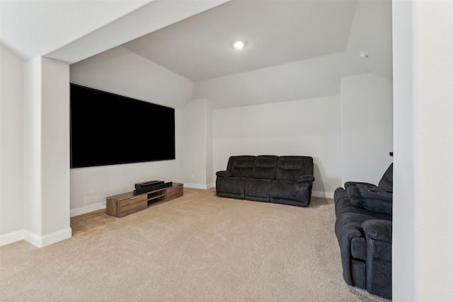 living room featuring light colored carpet and lofted ceiling