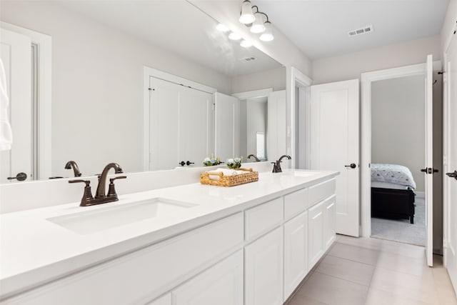 bathroom featuring vanity and tile patterned floors