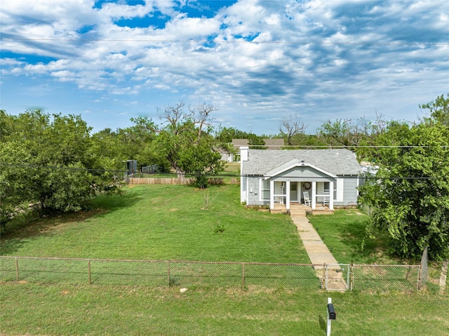 view of front of property with a porch and a front lawn