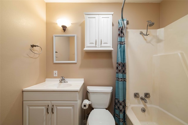 full bathroom featuring vanity, shower / bath combination with curtain, and toilet