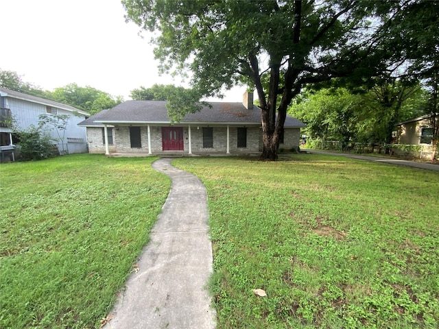 view of front of home with a front lawn