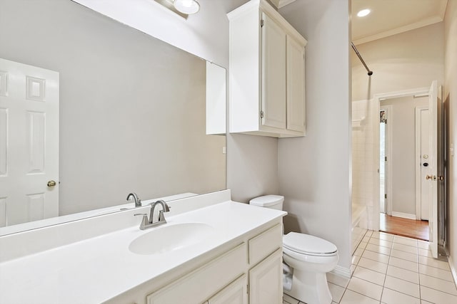 full bathroom with ornamental molding, wood-type flooring, bathtub / shower combination, vanity, and toilet