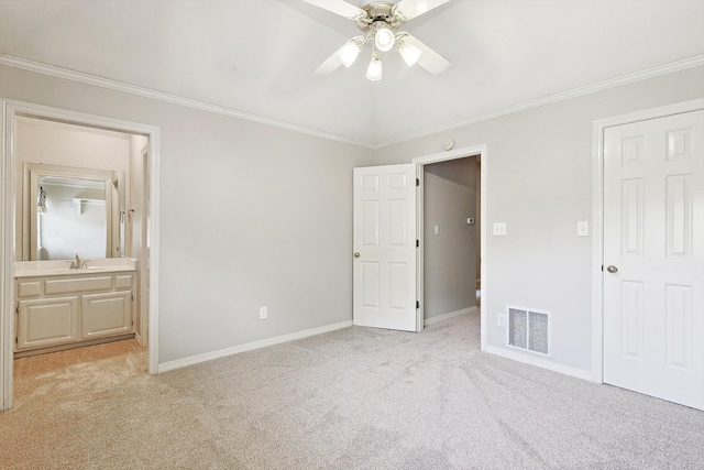 unfurnished bedroom featuring ceiling fan, ornamental molding, and light carpet