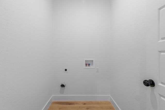 laundry room with washer hookup, electric dryer hookup, and hardwood / wood-style flooring