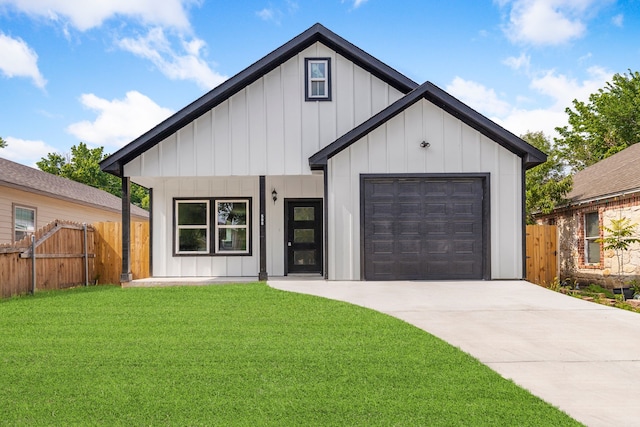 modern inspired farmhouse with a front lawn and a garage