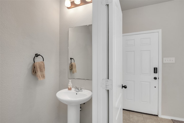 bathroom featuring tile patterned flooring