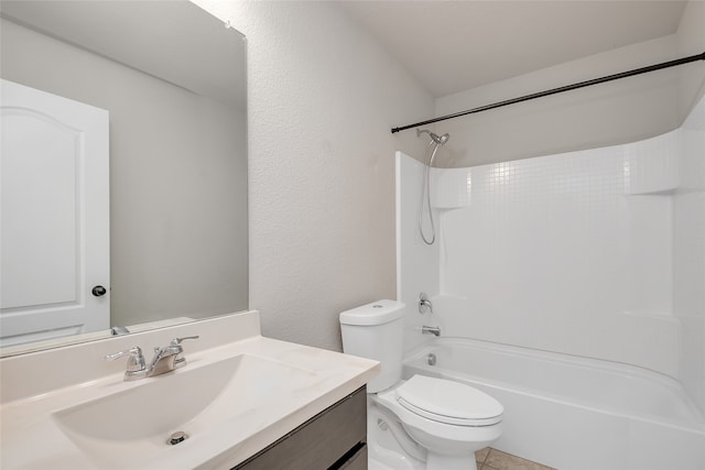 full bathroom featuring tile patterned floors, shower / washtub combination, vanity, and toilet