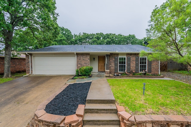 single story home featuring a garage and a front lawn