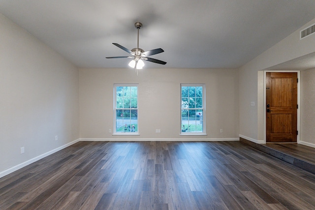 empty room featuring dark hardwood / wood-style floors and ceiling fan