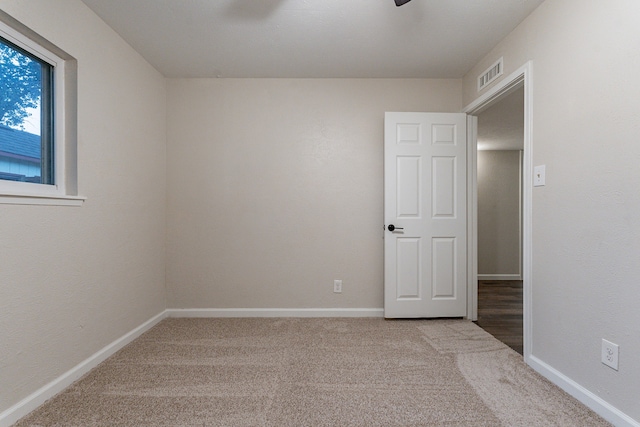 view of carpeted spare room