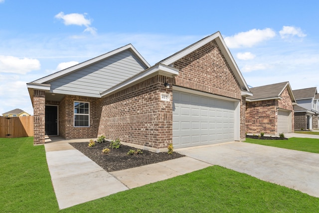 ranch-style home with a front yard and a garage