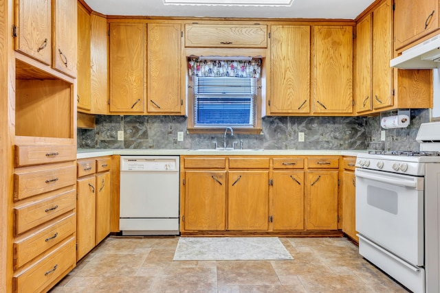 kitchen featuring ceiling fan, wood walls, backsplash, white stove, and light colored carpet