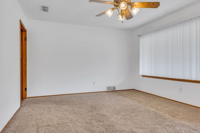 kitchen featuring range, dishwasher, ceiling fan, and a wealth of natural light