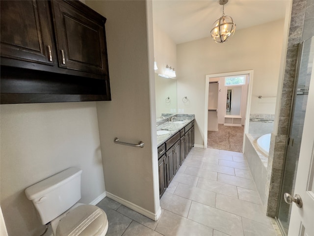 full bathroom with tile flooring, dual vanity, separate shower and tub, and toilet