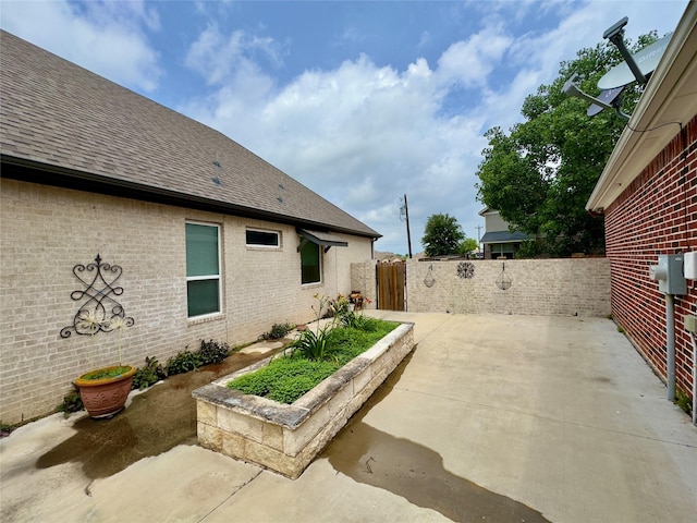 view of patio with fence
