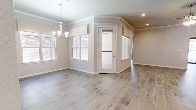 unfurnished dining area featuring baseboards, recessed lighting, ceiling fan with notable chandelier, wood finished floors, and crown molding