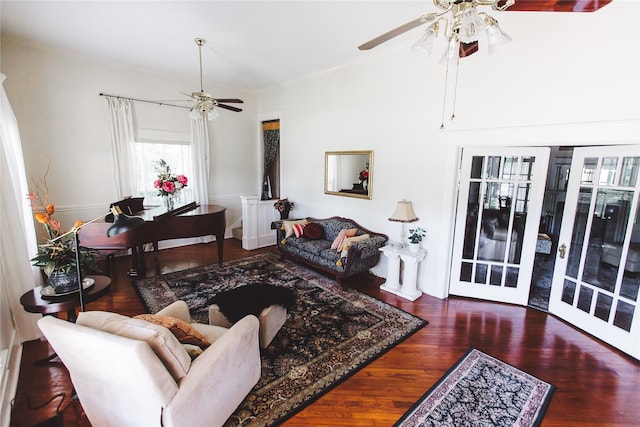 living room with crown molding, french doors, ceiling fan, and wood-type flooring