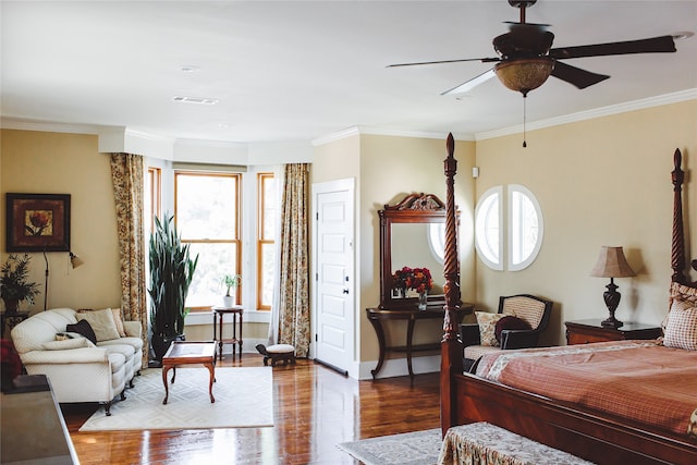 bedroom with light wood-type flooring, ceiling fan, and crown molding