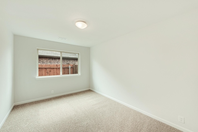 view of carpeted spare room