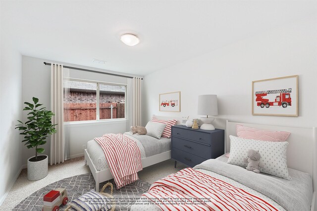 bedroom with dark carpet