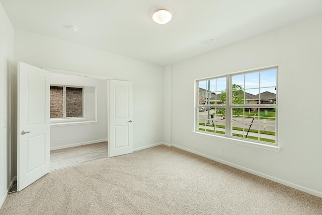 view of carpeted spare room