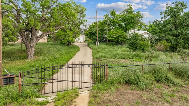 exterior space with fence and an outdoor structure