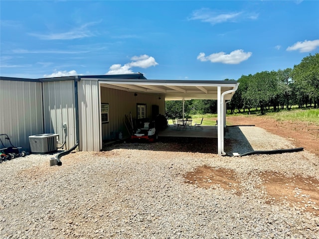 view of parking / parking lot with a carport