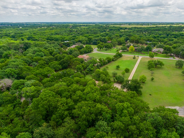 aerial view featuring a rural view and a view of trees