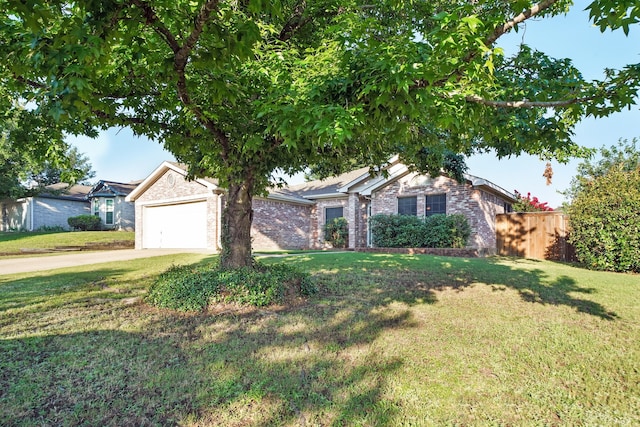 single story home featuring a front yard and a garage