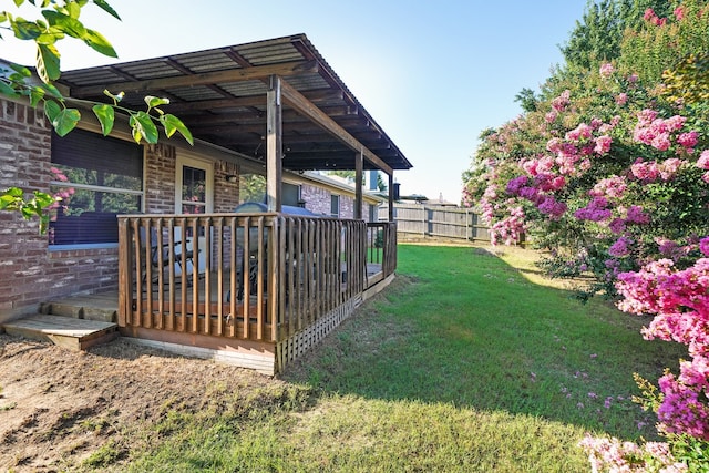 view of yard with a deck