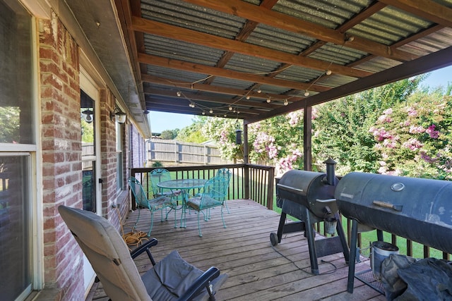 wooden deck featuring grilling area