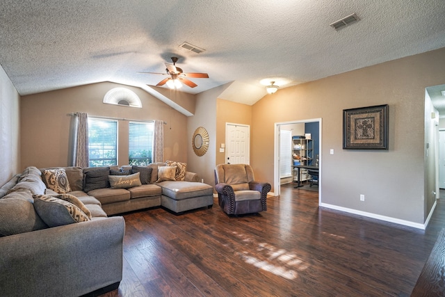 living room with a textured ceiling, ceiling fan, lofted ceiling, and dark wood-type flooring