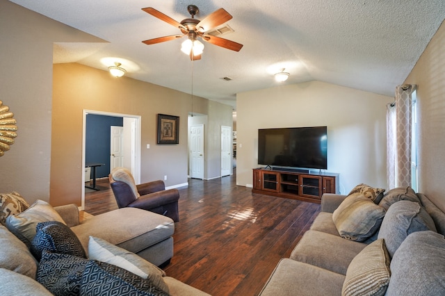 living room with a textured ceiling, dark hardwood / wood-style floors, ceiling fan, and lofted ceiling