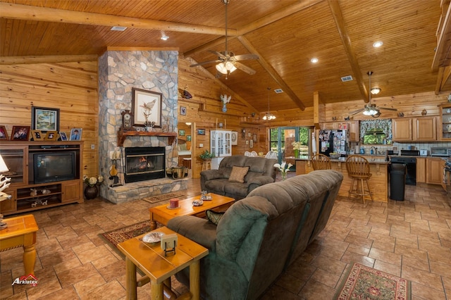 living room featuring wood ceiling, high vaulted ceiling, wood walls, and beam ceiling