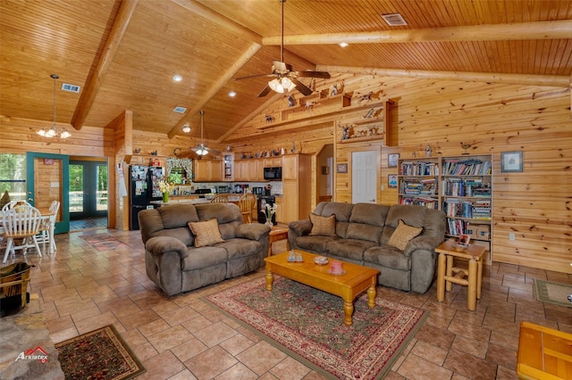 living room with wood ceiling, high vaulted ceiling, wood walls, and beamed ceiling