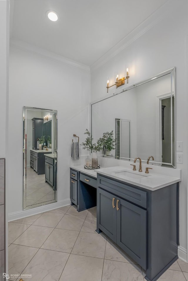 bathroom featuring tile patterned flooring, crown molding, and vanity