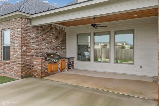 view of patio featuring ceiling fan, a grill, and area for grilling