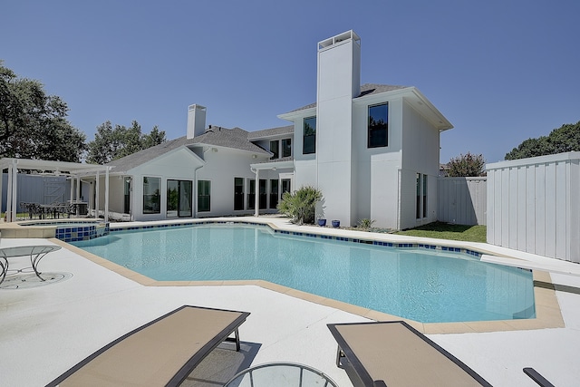 view of swimming pool with a patio