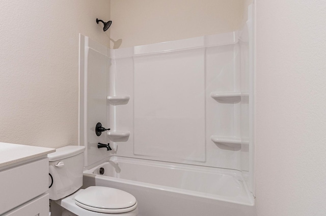 full bathroom featuring vanity, bathtub / shower combination, and toilet