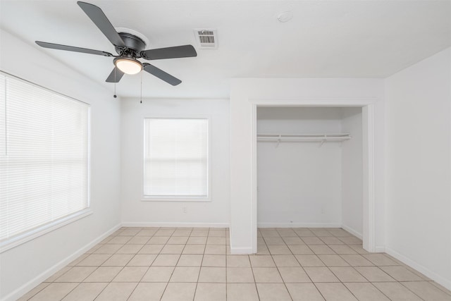 3912 Valentine St, Fort Worth, TX 76107 - unfurnished bedroom featuring light tile patterned floors, visible vents, a closet, and multiple windows