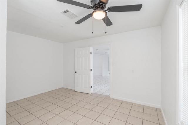 3912 Valentine St, Fort Worth, TX 76107 - unfurnished room featuring light tile patterned floors, a ceiling fan, visible vents, and baseboards