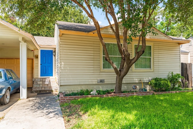 3912 Valentine St, Fort Worth, TX 76107 - view of property exterior featuring an attached garage, a yard, roof with shingles, entry steps, and fence