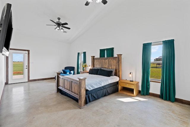 bedroom with high vaulted ceiling, concrete floors, and ceiling fan