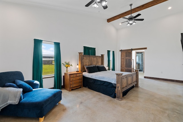 carpeted bedroom with beam ceiling, a towering ceiling, a barn door, and ceiling fan