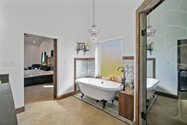 bathroom featuring a towering ceiling, an inviting chandelier, and shower with separate bathtub