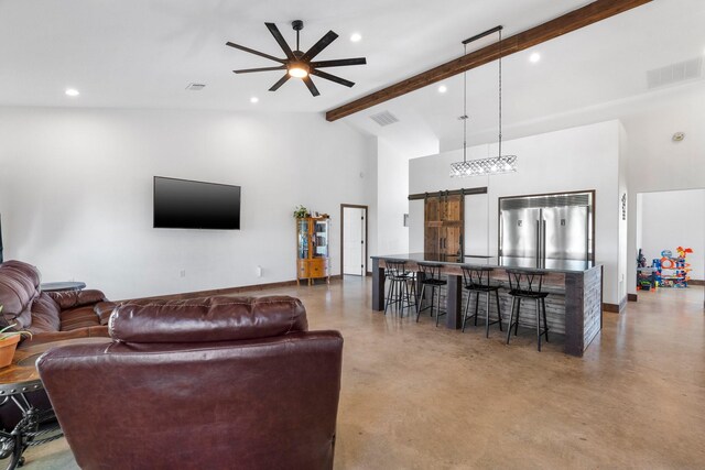 living room with high vaulted ceiling, ceiling fan, a barn door, and beam ceiling