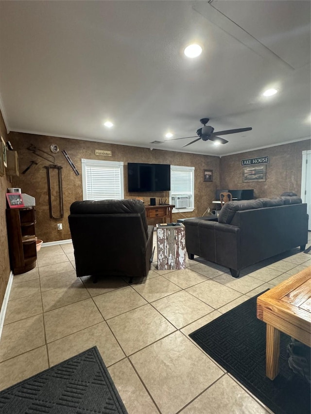 living room featuring ceiling fan and light tile patterned floors