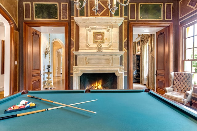 game room featuring carpet flooring, ornamental molding, and billiards